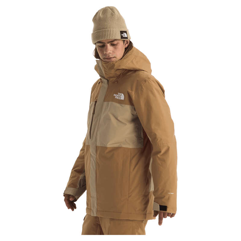 Man wearing The North Face Freedom Insulated Ski Jacket in Utility Brown-Khaki Stone