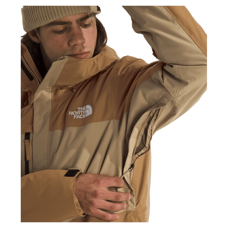 Man wearing The North Face Freedom Insulated Ski Jacket in Utility Brown-Khaki Stone
