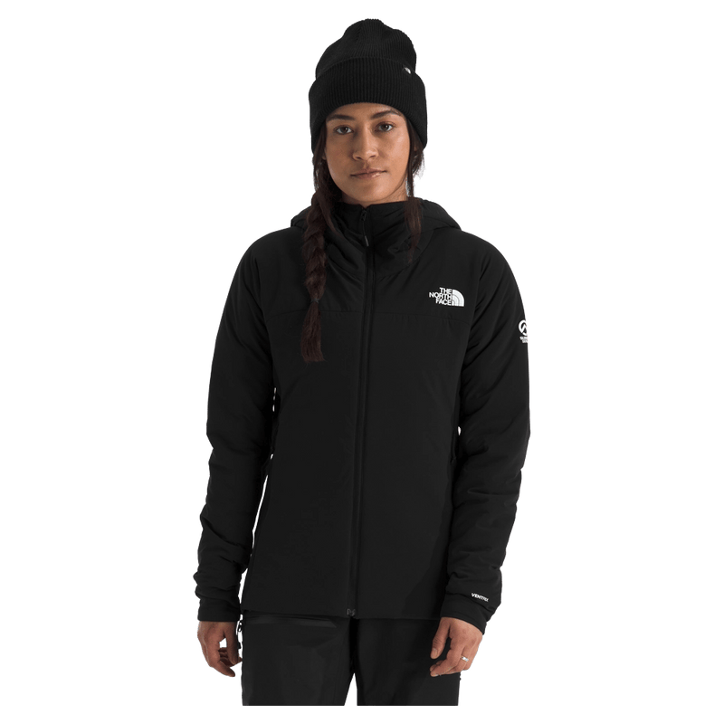 Woman wearing The North Face Summit Casaval Hybrid Hoodie in black, full front zip, hood, small white logo on left chest.