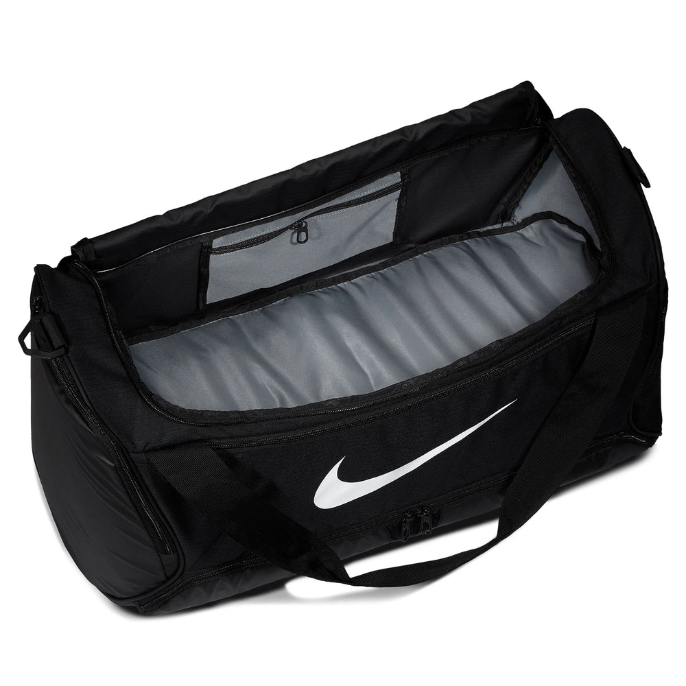 Top internal image of the main pocket of the Nike Brasilia Duffel in Black with brand logo in contrast White