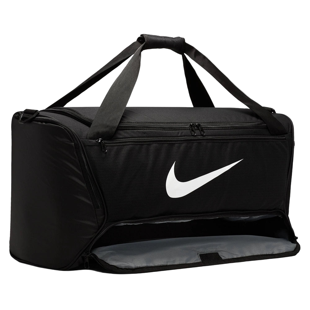 Image of lower dry pocket of the Nike Brasilia Duffel in Black with brand logo in contrast White
