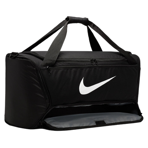 Image of lower dry pocket of the Nike Brasilia Duffel in Black with brand logo in contrast White