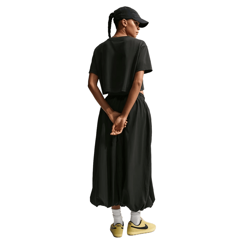 Back view of the Nike Classic Cropped Tee in Black colourway, women model