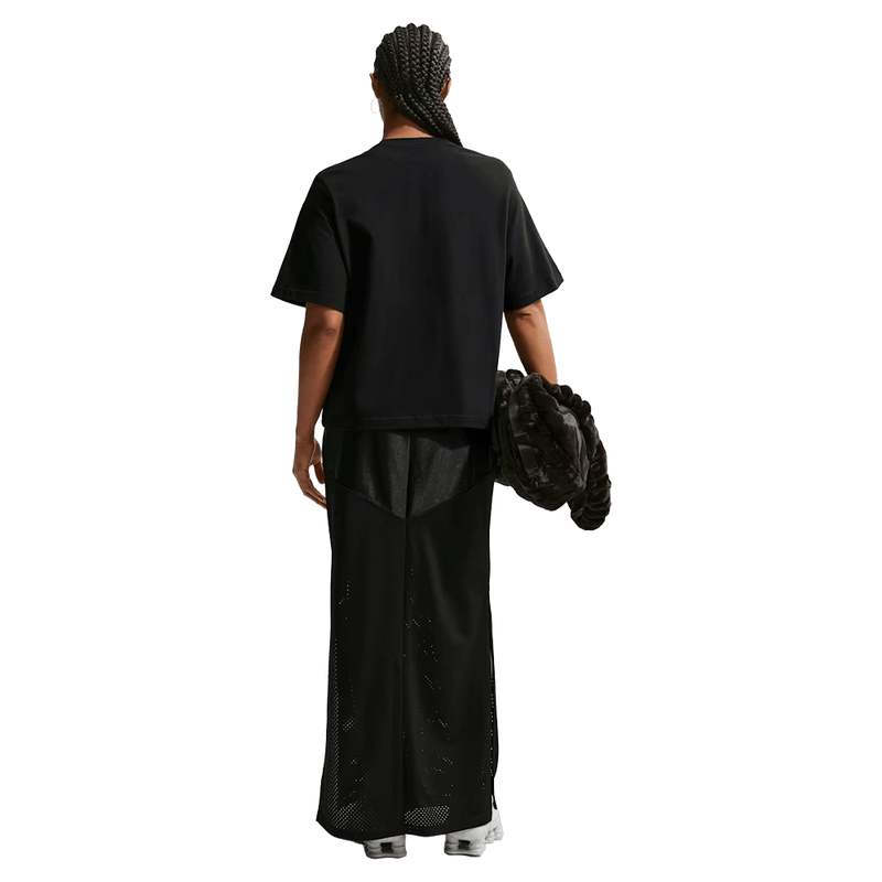 Back view of the Nike Classic Tee in Black colourway, women model