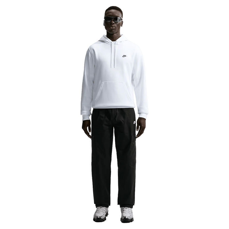 Front view of the Nike Club Cargo Pants in Black colourway, unisex model