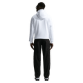 Back view of the Nike Club Cargo Pants in Black colourway, unisex model