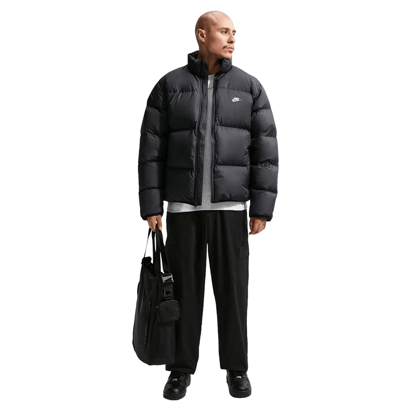 Full-body view of the Nike Club Down Puffer in Black colourway, unisex model