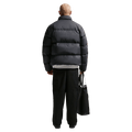 Back view of the Nike Club Down Puffer in Black colourway, unisex model