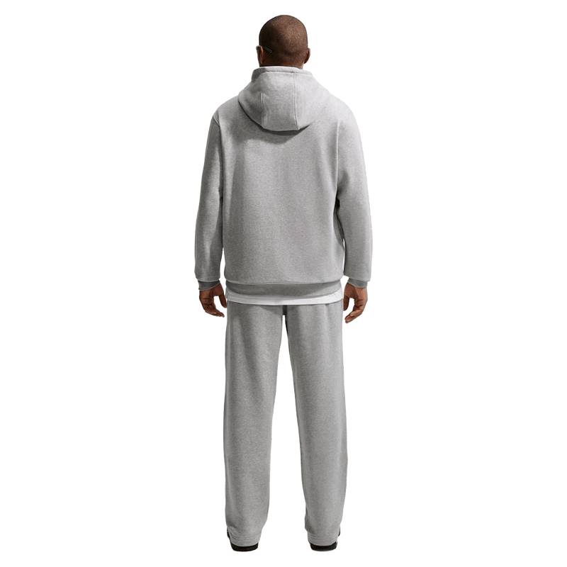 Back view of the Nike Club Fleece Hoodie in Dark Grey Heather colourway, unisex model