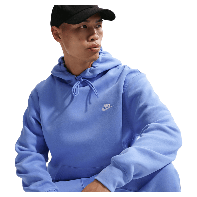 Main view of the Nike Club Fleece Hoodie in Royal Pulse colourway, unisex model
