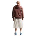 Back view of the Nike Club Fleece Hoodie in Tatto colourway, unisex model