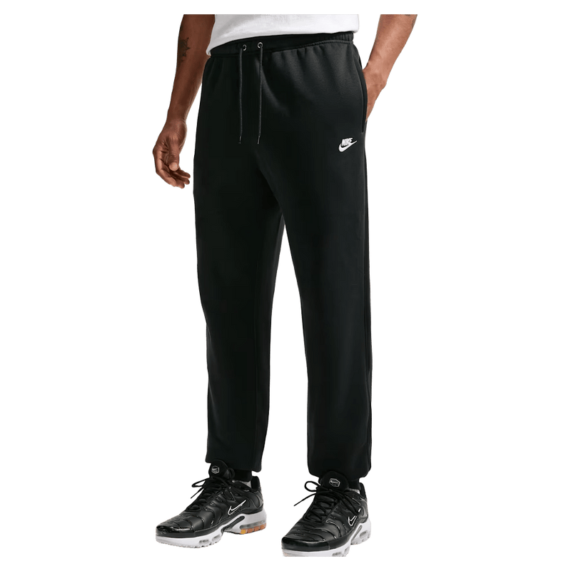 Main view of the Nike Club Track Pants in Black and White colourway, unisex model