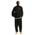 Front view of the Nike Club Track Sweatpants in Black and White colourway, men model