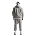 Back view of the Nike Club Track Sweatpants in Dark Grey Heather and light Smoke colourway, men model