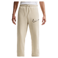 Main view of the Nike Club Track Sweatpants in Light Khaki and Obsidian colourway, men model