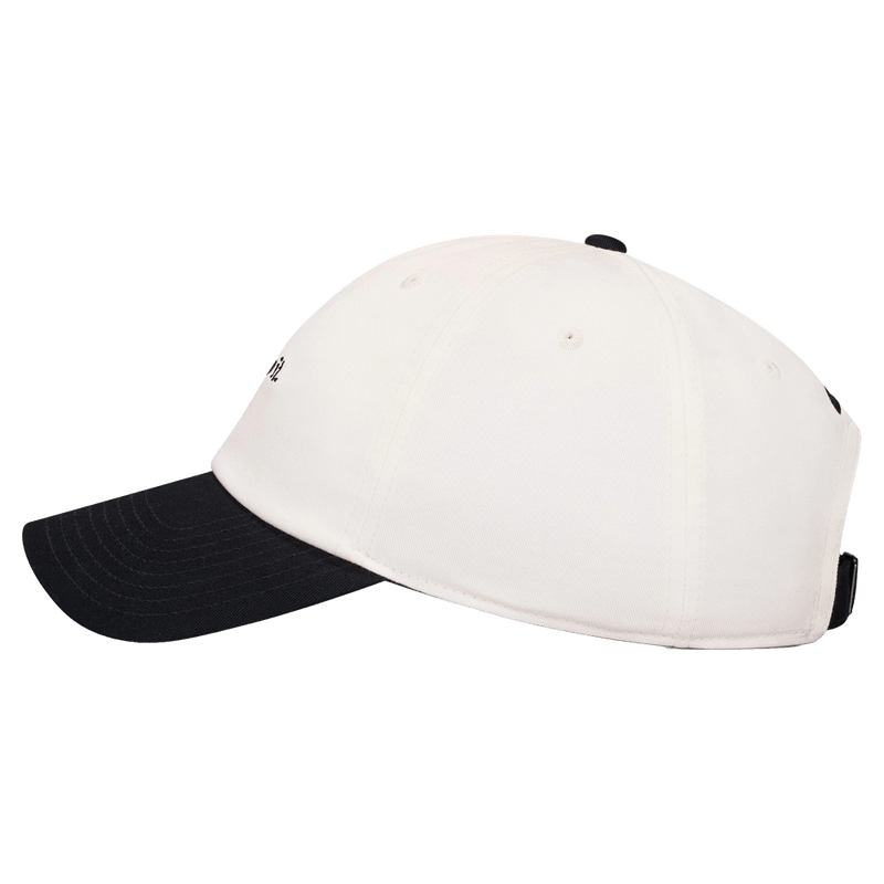 Side view of the Nike Club Cap in Sail and Black colourway, unisex model