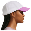 Side view of the Nike Club Cap in White and Lt Magenta colourway, unisex model