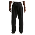 Back view of the Nike Club Pants in Black colourway, unisex model