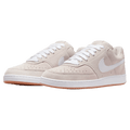 Pair view of the Nike Court Vision Low FL Shoes in Light Orewood Brown colourway, unisex model