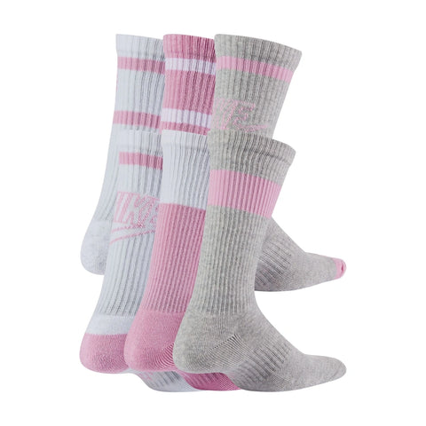 Back, on body image of the Nike Everyday Kids Cushioned Crew Socks 6 pack in the multi - pink, white, grey, colourway