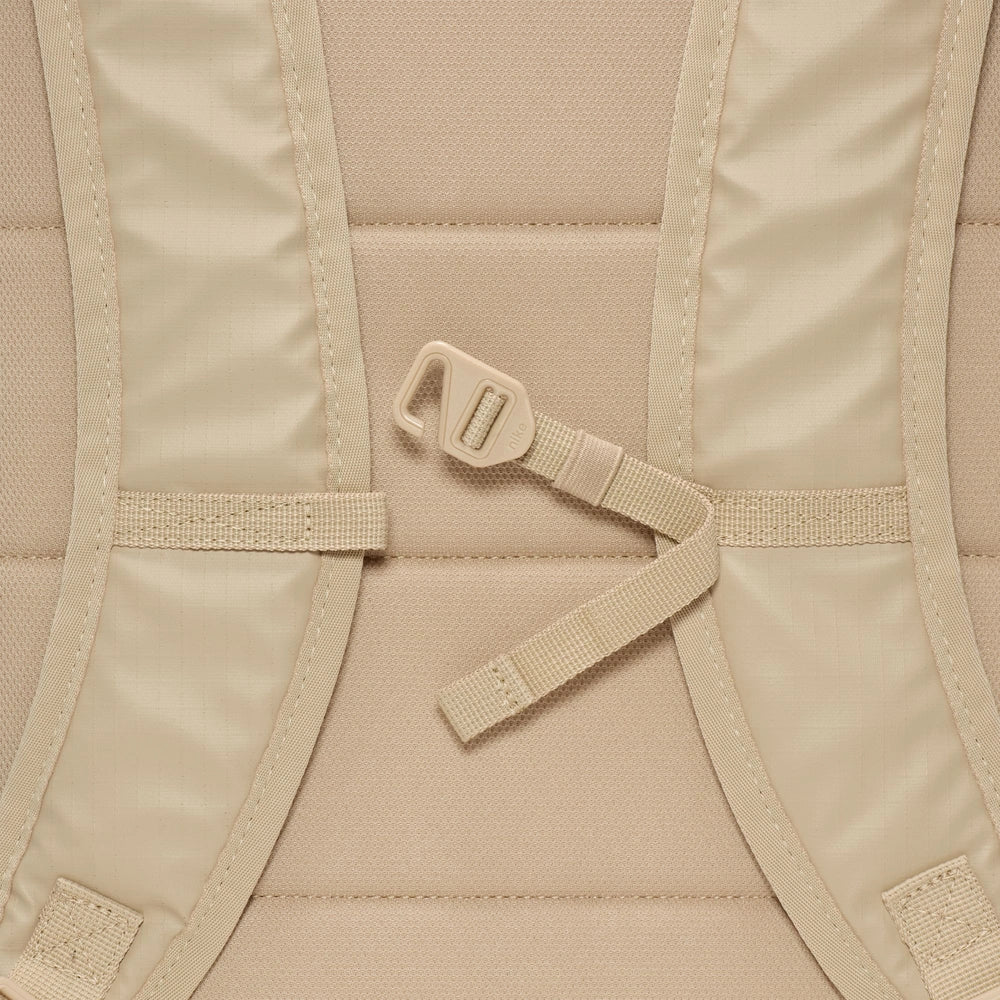 Image of the chest strap on the Heritage Backpack - Winterized Eugene in Desert Khaki