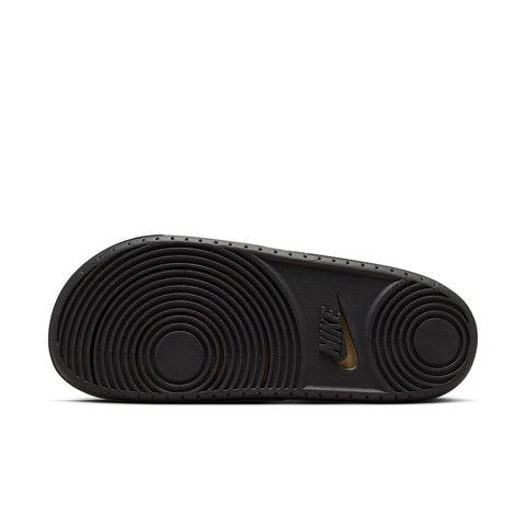 Image of the sole of a Nike Offcourt Slides in Khaki Black Black