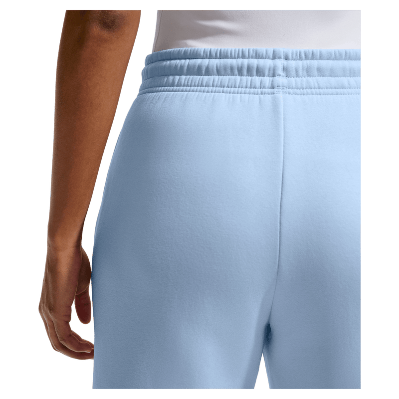 Detail view of the Nike Phoenix Fleece Sweatpants in Hydrogen Blue colourway, women model