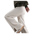 Detail view of the Nike Phoenix Fleece Sweatpants in Light Orewood Brown colourway, women model