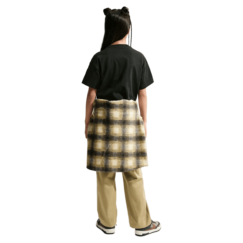 Back view of the Nike SB Tee in Black colourway, kids model
