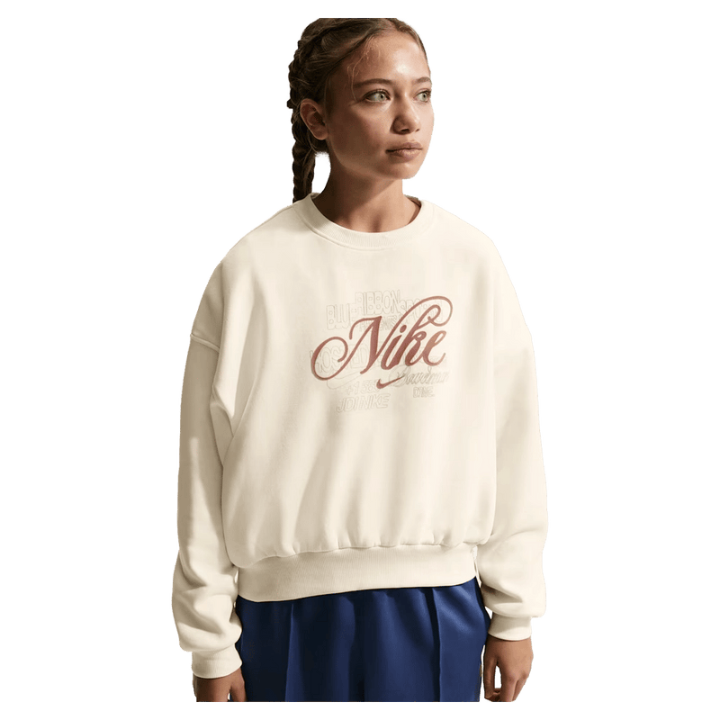 Main view of the Nike  Sportswear Club Fleece Crew Neck in Soft Pearl colourway, kids model