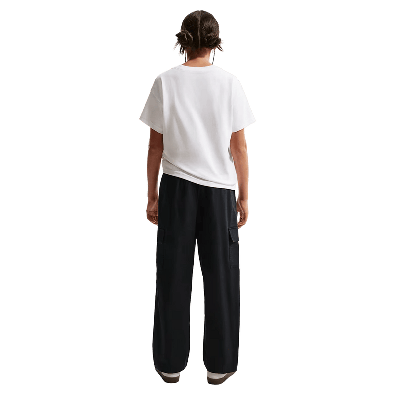 Back view of the Nike Sportswear Club Woven Cargo Pants in Black and White colourway, kids model