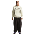 Front view of the Nike Sportswear Club Hoodie in Light Khaki colourway, unisex model