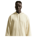 Main view of the Nike Sportswear Club Hoodie in Light Khaki and white colourway, unisex model