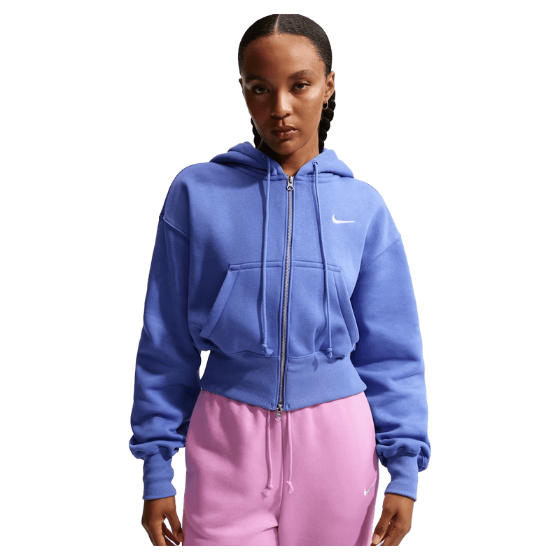 Main view of the Nike Sportswear Phoenix Fleece Full-Zip Cropped Hoodie in Hydrogen Blue colourway, women model