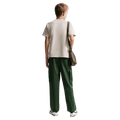 Back view of the Nike Sportswear Tee in Light Orewood Brown colourway, kids model
