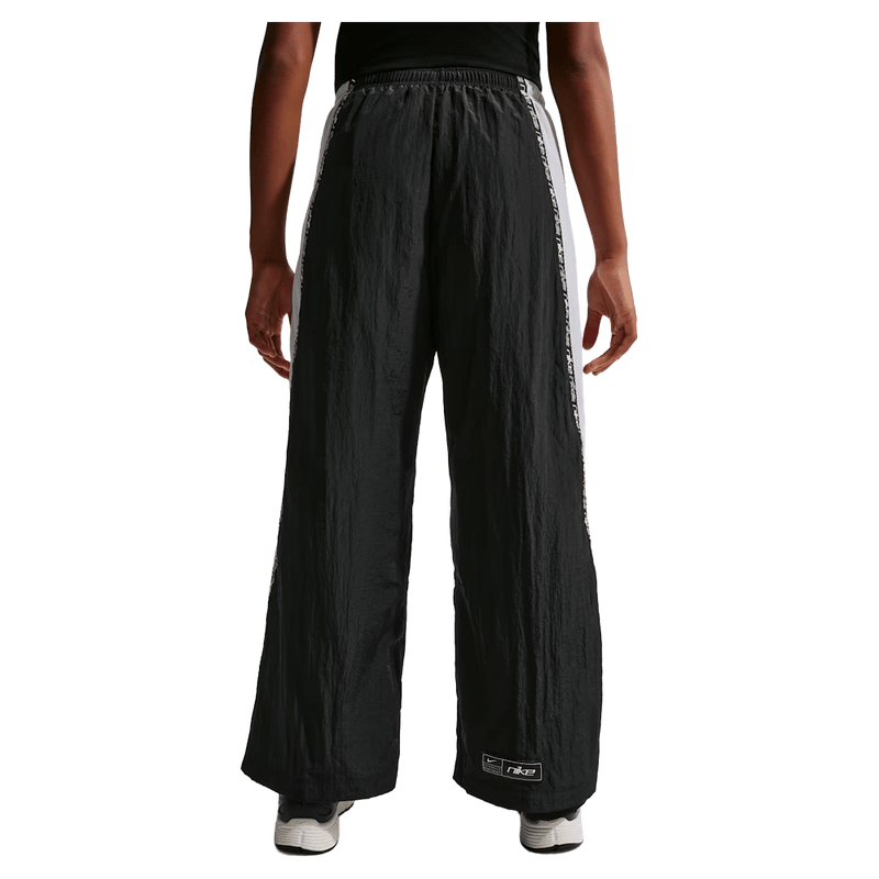 Back view of the Nike Sportwear Pants in Black colourway, kids model