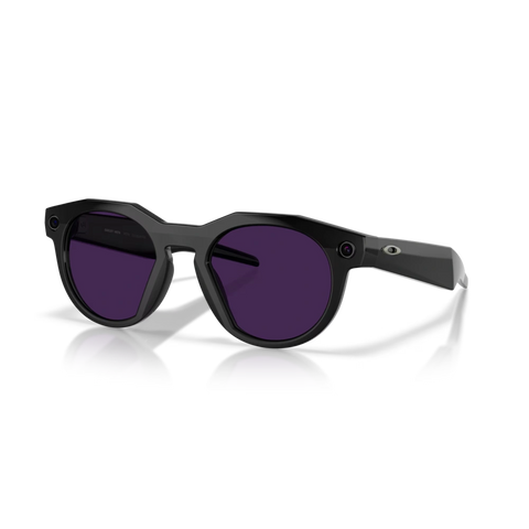 Main view of the Oakley 2026 HSTN Meta Sunglasses in Black - Transitions Amethyst colourway, unisex's model.
