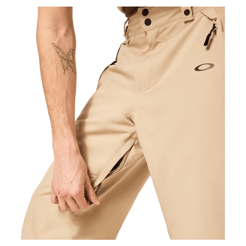 Detail view of the Oakley Best Cedar Rc Insulated Ski Pants in Pebble colourway, mens's model