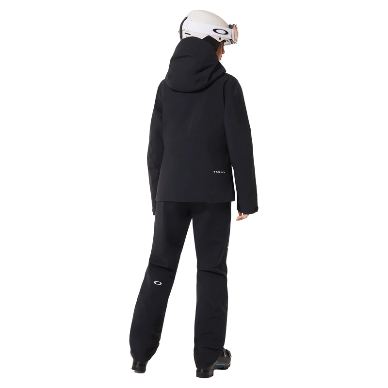 Back view of the Oakley Canopy Insulated Jacket in Blackout colourway, women model