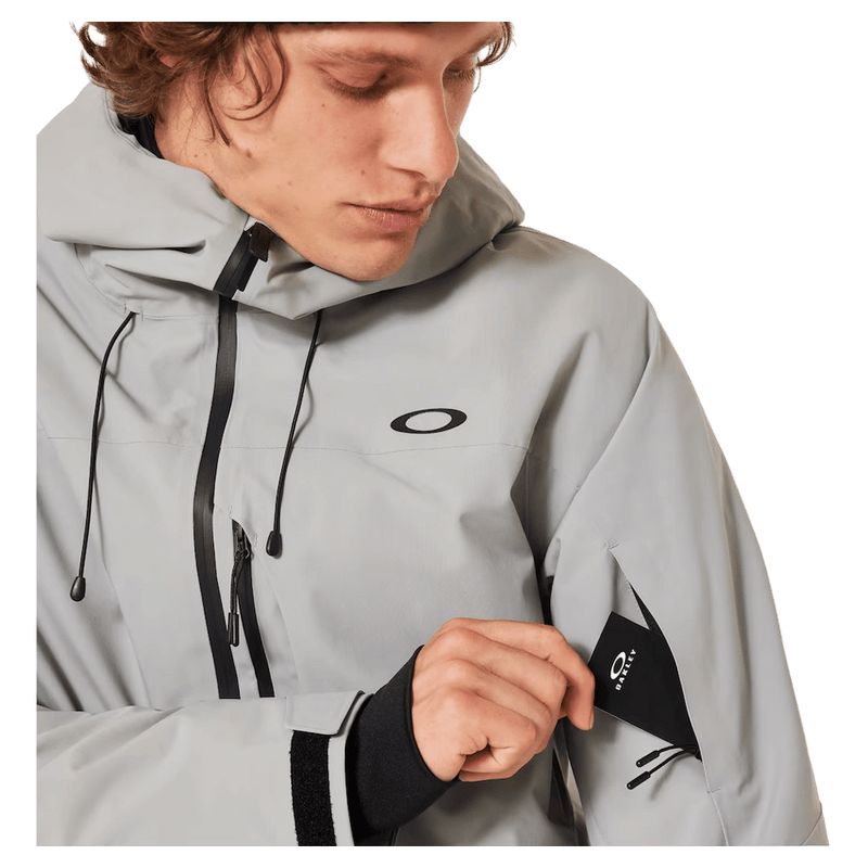 Pass pocket view of the Oakley Canopy Insulated Ski Jacket in Cement colourway, men's model