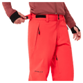 Detail view of the Oakley Canopy Insulated Ski Pants in HIBISCUS RED colourway, women model