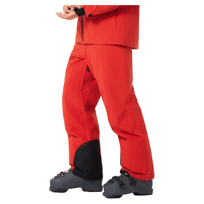 Main view of the Oakley Canopy Insulated Ski Pants in HIBISCUS RED colourway, men's model
