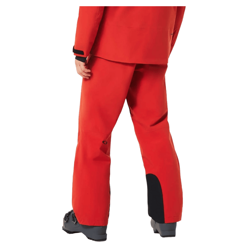 Back view of the Oakley Canopy Insulated Ski Pants in HIBISCUS RED colourway, men's model