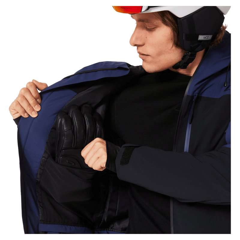 Inside pocket view of the Oakley Canopy Pro Insulated Ski Jacket in ABYSS and BLACK colourway, men's model