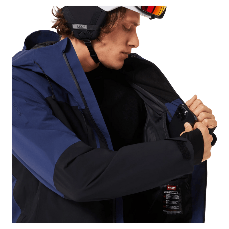 Inside pocket view of the Oakley Canopy Pro Insulated Ski Jacket in ABYSS and BLACK colourway, men's model