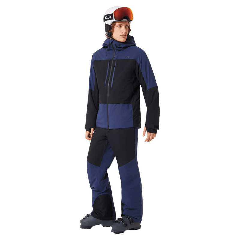Full-body view of the Oakley Canopy Pro Insulated Ski Jacket in ABYSS and BLACK colourway, men's model