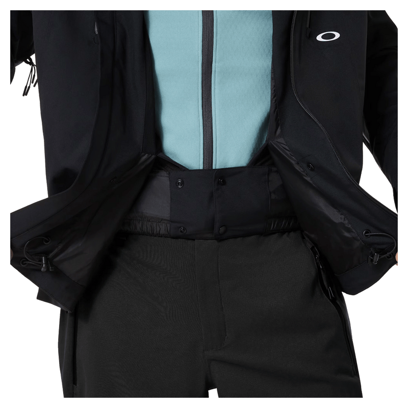 Powder skirt view of the Oakley Kendall Rc Shell 2.0 Ski Jacket in Blackout colourway, men's model