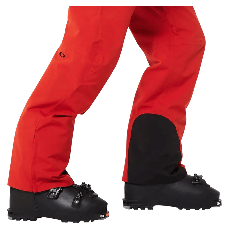 Detail view of the Oakley Kendall Rc Shell Ski Pants in Red Flame colourway, men's model
