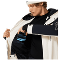 Inside pocket view of the Oakley Tnp Tbt Insulated Ski Jacket in Mist colourway, unisex's model