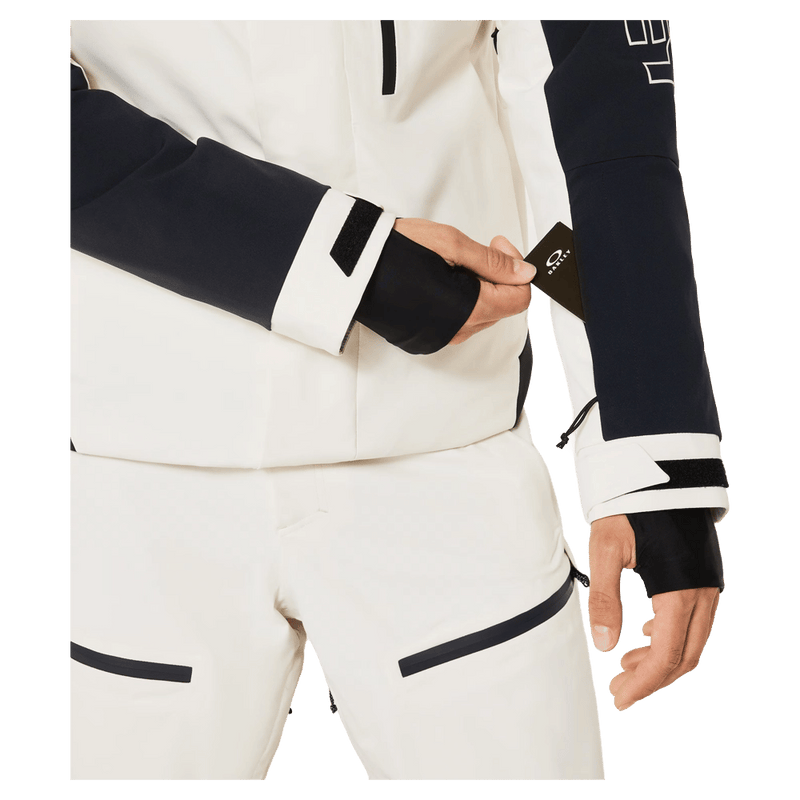 Pass pocket view of the Oakley Tnp Tbt Insulated Ski Jacket in Mist colourway, unisex's model